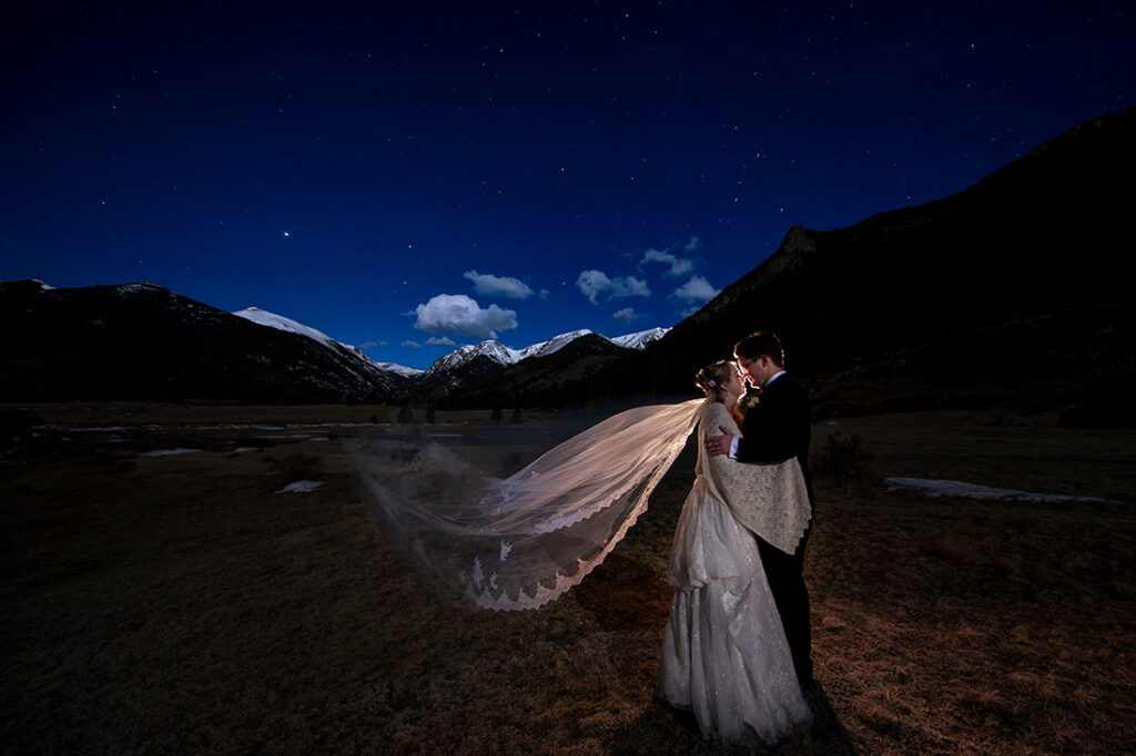 bride and groom under the stars in Rocky Mountain National Park