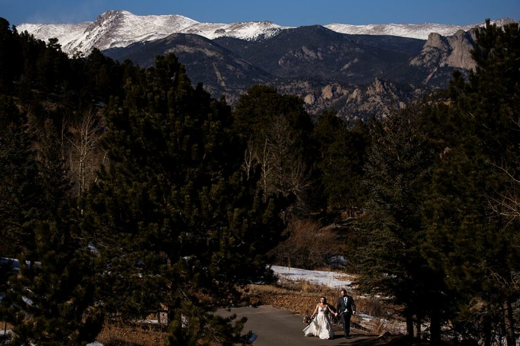 Taharaa Mountain Lodge wedding bride and groom hiking in the mountains
