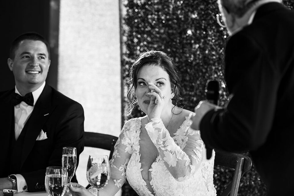 bride crying during her father's wedding speech