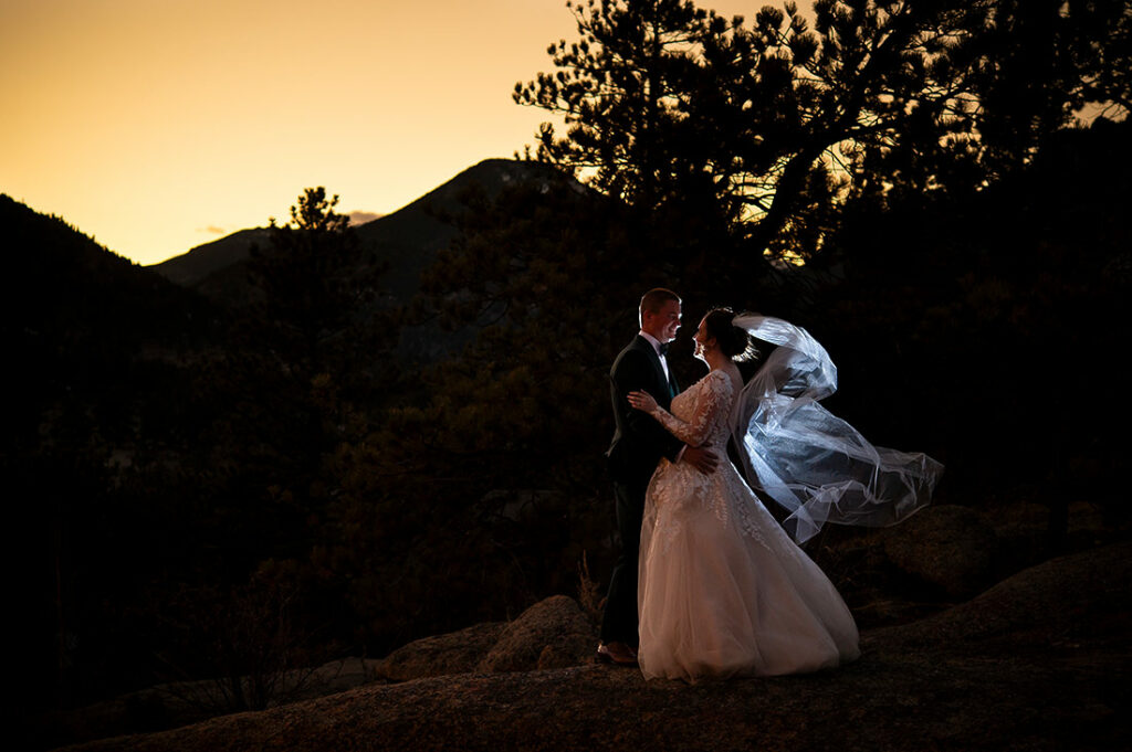 sunset portrait of bride and groom at Estes Park wedding at Black Canyon Inn
