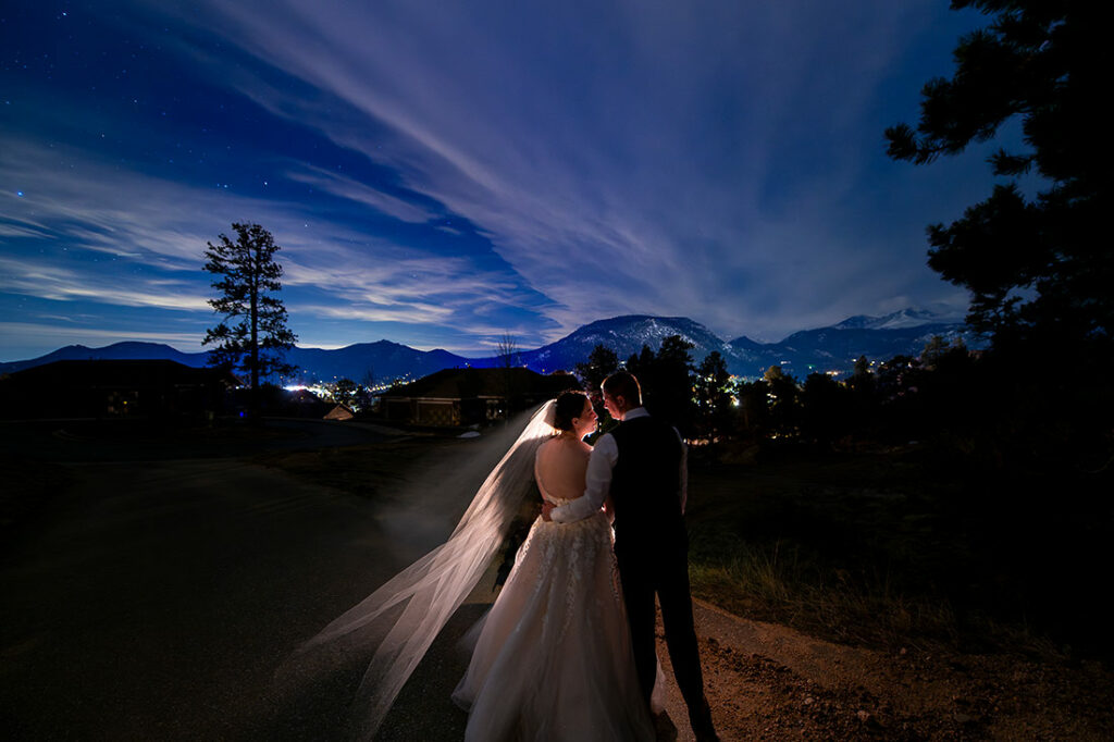 bride and groom under the stars at Estes Park wedding at Black Canyon Inn