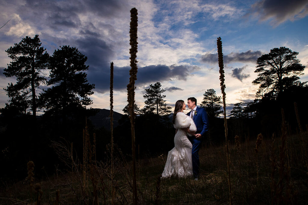 sunset portrait of bride and groom at Estes Park wedding at Della Terra